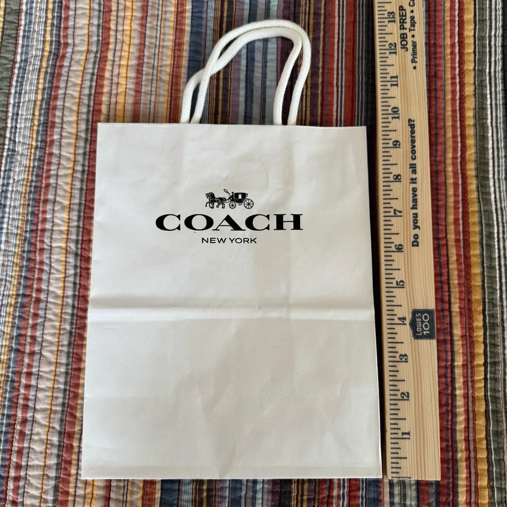 Coach white paper shopping or gift bag. Black Logo. White Rope Handles 10x8x4.5